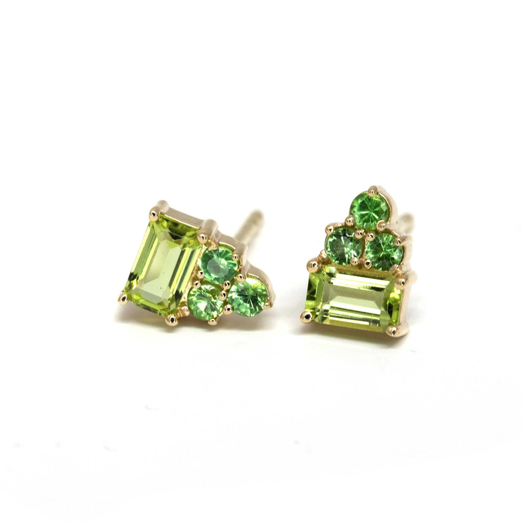 Ruby Mardi offers a lovely collection of funky fine gemstone stud earrings that shine and add a pop of colour to your ear.   Here, beautiful baguette cut peridot with round tsavorite garnet, et in 14k yellow gold.  We carefully select the gemstones so they are all of the highest quality. We prioritize traceable and natural gems. Ruby Mardi also offers custom jewelry services in Montreal.