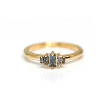 salt and pepper baguette diamond yellow gold bridal designer ring from montreal at ruby mardi on a white background