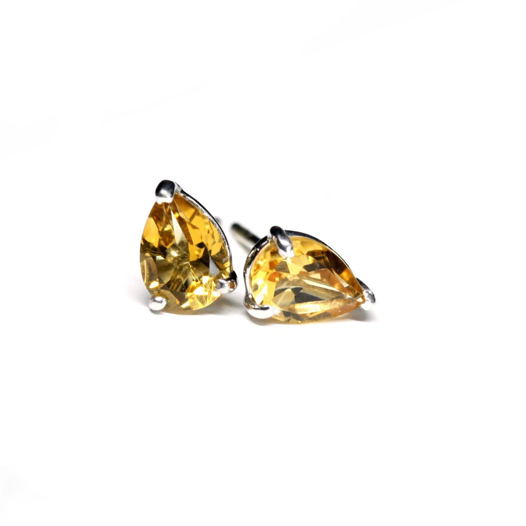 pear shape citrine gemstone stud earrings minimalist jewelry made in montreal by ruby mardi jeweler in little italy villeray on a white background