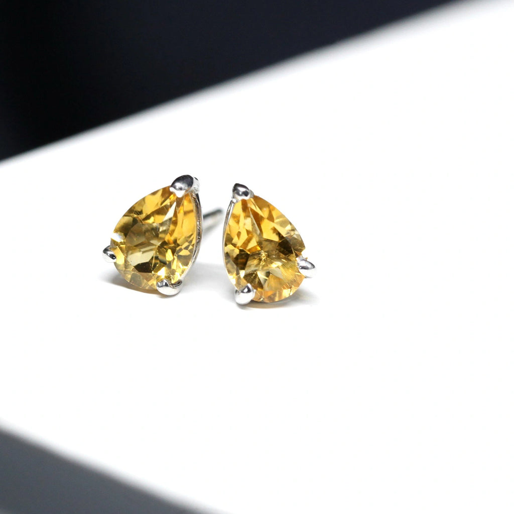 Front view of pear shape orange yellow gemstone citrine quartz stud earrings silver made by Bena Jewelry Montreal Fine jewelry designer made in Canada