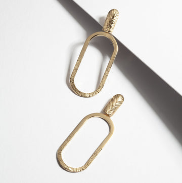 Big textured hoop earrings in gold vermeil handmade in Montreal by local jewelry brand Veronique Roy JWLS.