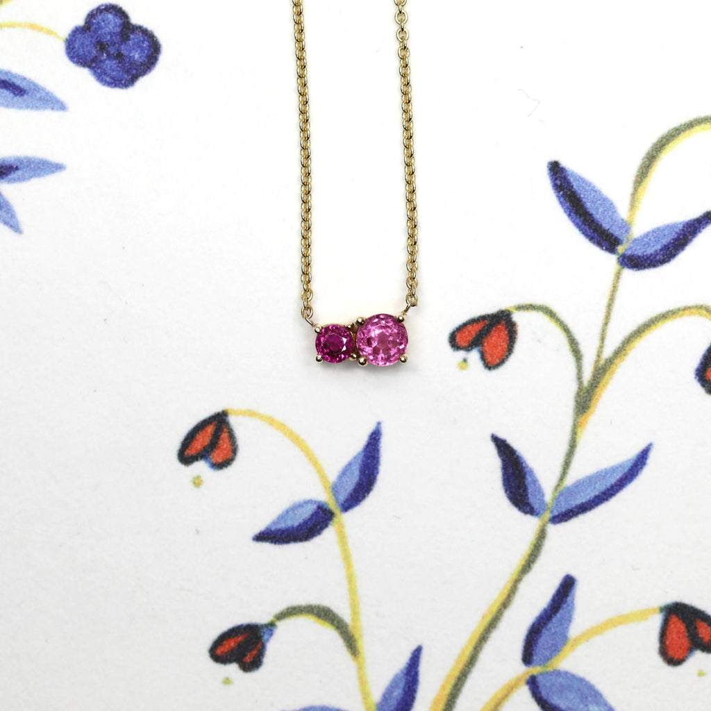Yellow gold pendant with rose gemstones : a natural rubelite and a genuine tourmaline. One of a kind jewel that can be found at high end concept store Ruby Mardi.