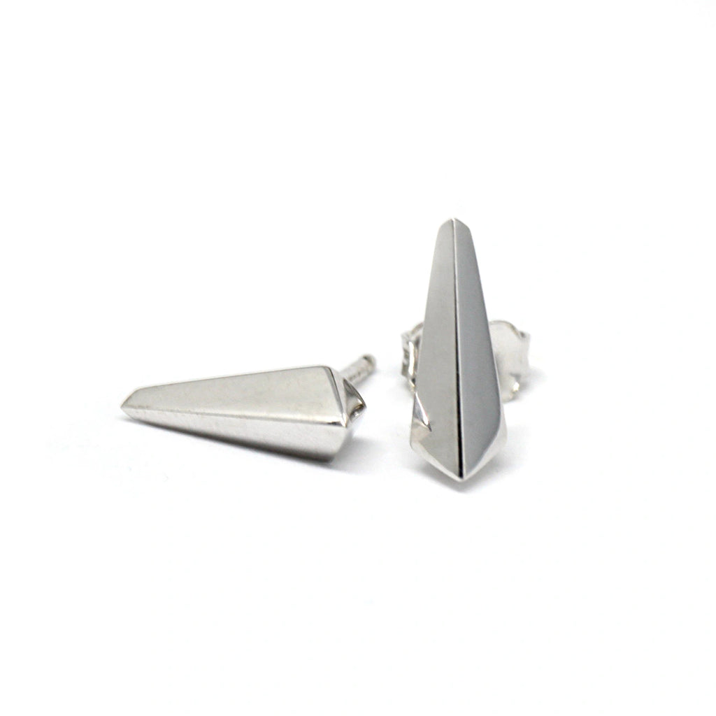 silver edgy blade earrings unoisex design made on a white background