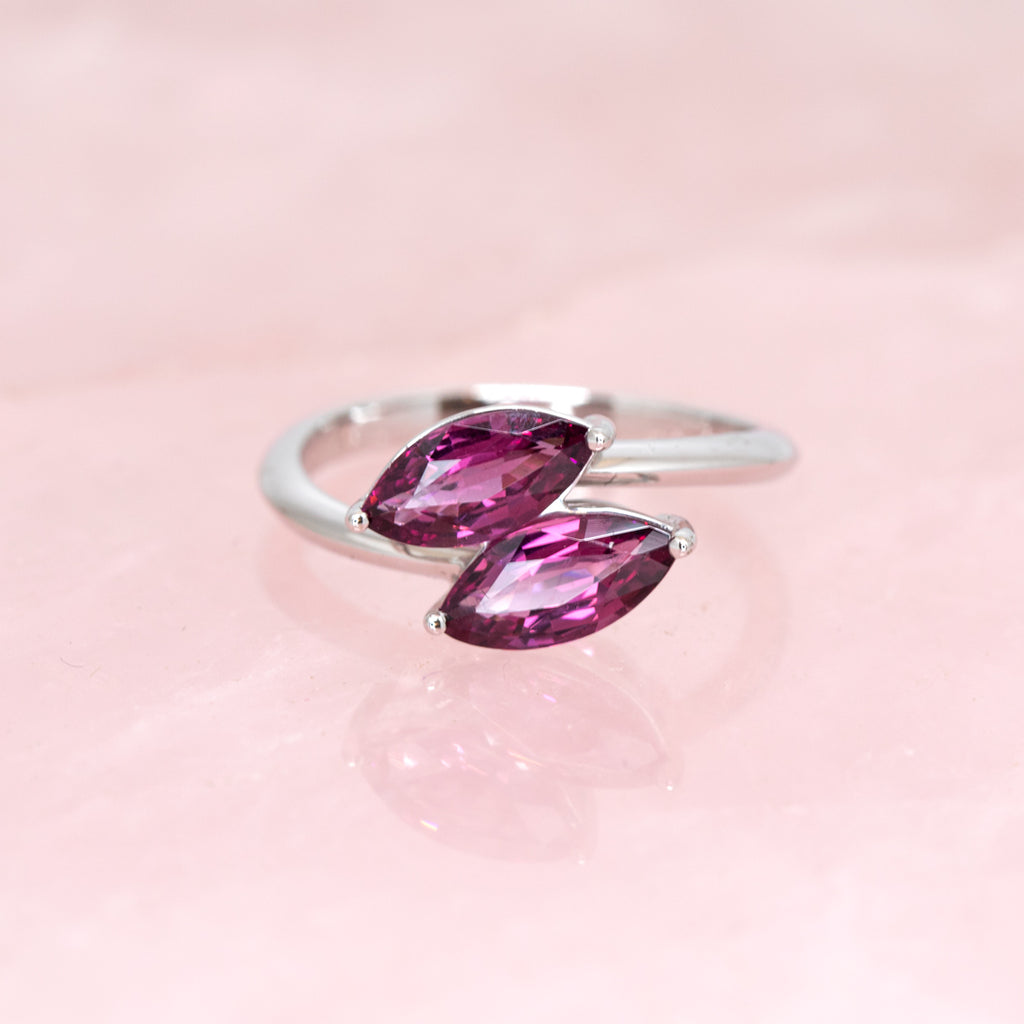 Double Marquise Shape rhodolite garnet white gold toi&moi Engagement ring by Ruby Mardi, a fine jewelry gallery in Montreal Little Italy. White gold gemstone ring, bridal jewelry, wedding ring, ethical gem. Ruby Mardi offers custom jewelry services in Montreal. 