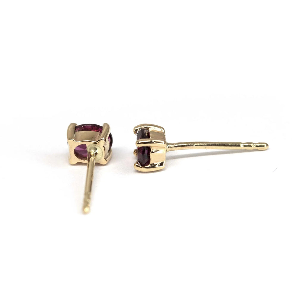 back view of yellow gold red garnet minimalist stud earrings made in montreal by bena jewelry designer for boutique ruby mardi fine jeweller on a white background