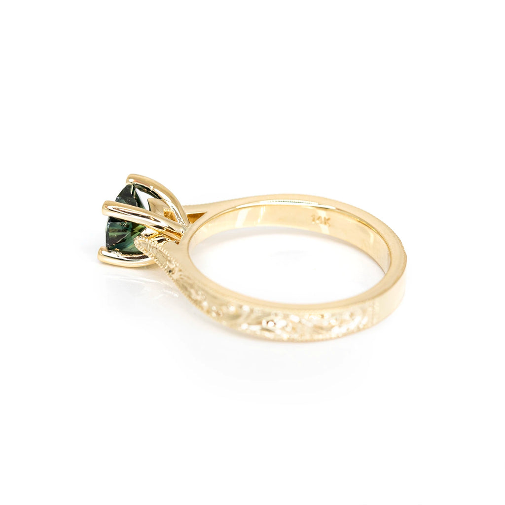 yellow gold round green sapphire bridal colored gemstone engagement ring desginer fine jewellery by artisan Deborah Lavery for the best jewelry store in montreal boutique ruby mardi jeweler in little italy on a white background