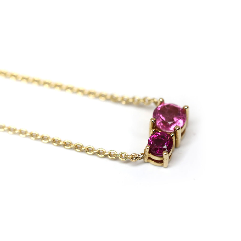 A colorful gemstone necklace in 14k gold featuring a pink tourmaline and a rubelite, handmade by Lico Jewelry in Montreal. Find it at Ruby Mardi, a high end hidden gem in Little Italy that presents the work of the most talented Canadian jewelry designer and offers custom jewelry design services.