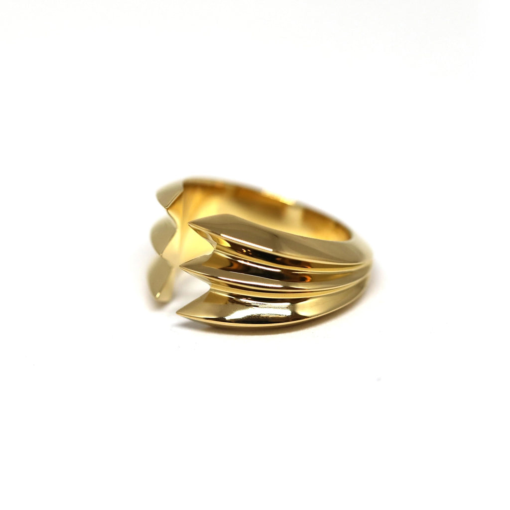 side view of vermeil gold edgy unisex bold ring modern statement fashion rings custom made in montreal at boutique ruby mardi best jeweler gallery on a white background
