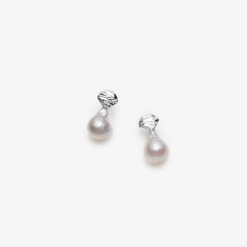 Fireball baroque freshwater pearl sterling silver earrings, handmade in Montreal by Véronique Roy, and available at jewelry store Ruby Mardi.