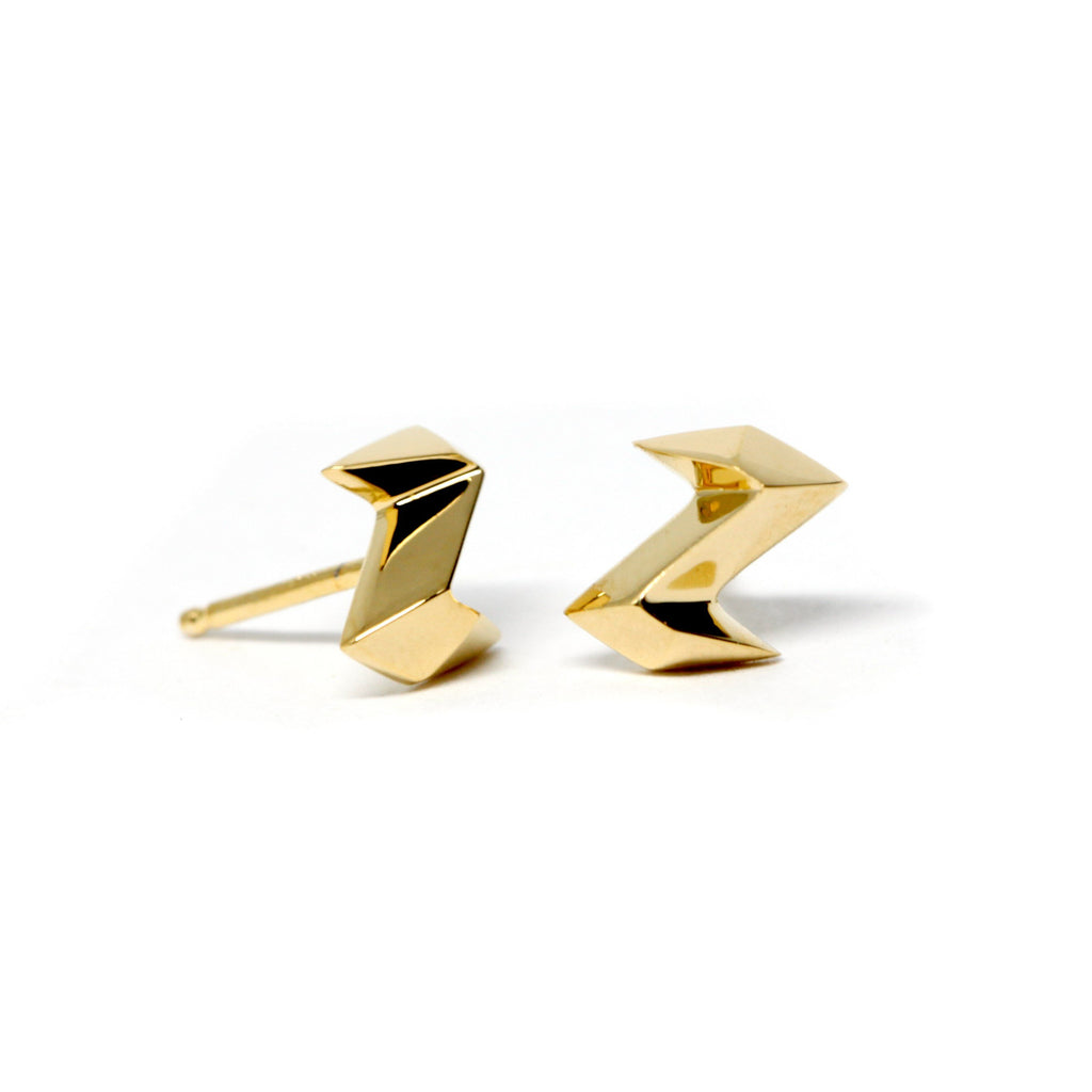 side view of vermeil gold edgy stud earrings custom made in montreal by the best jeweler bena jewelry canadian boutique ruby mardi in montreal on a white background