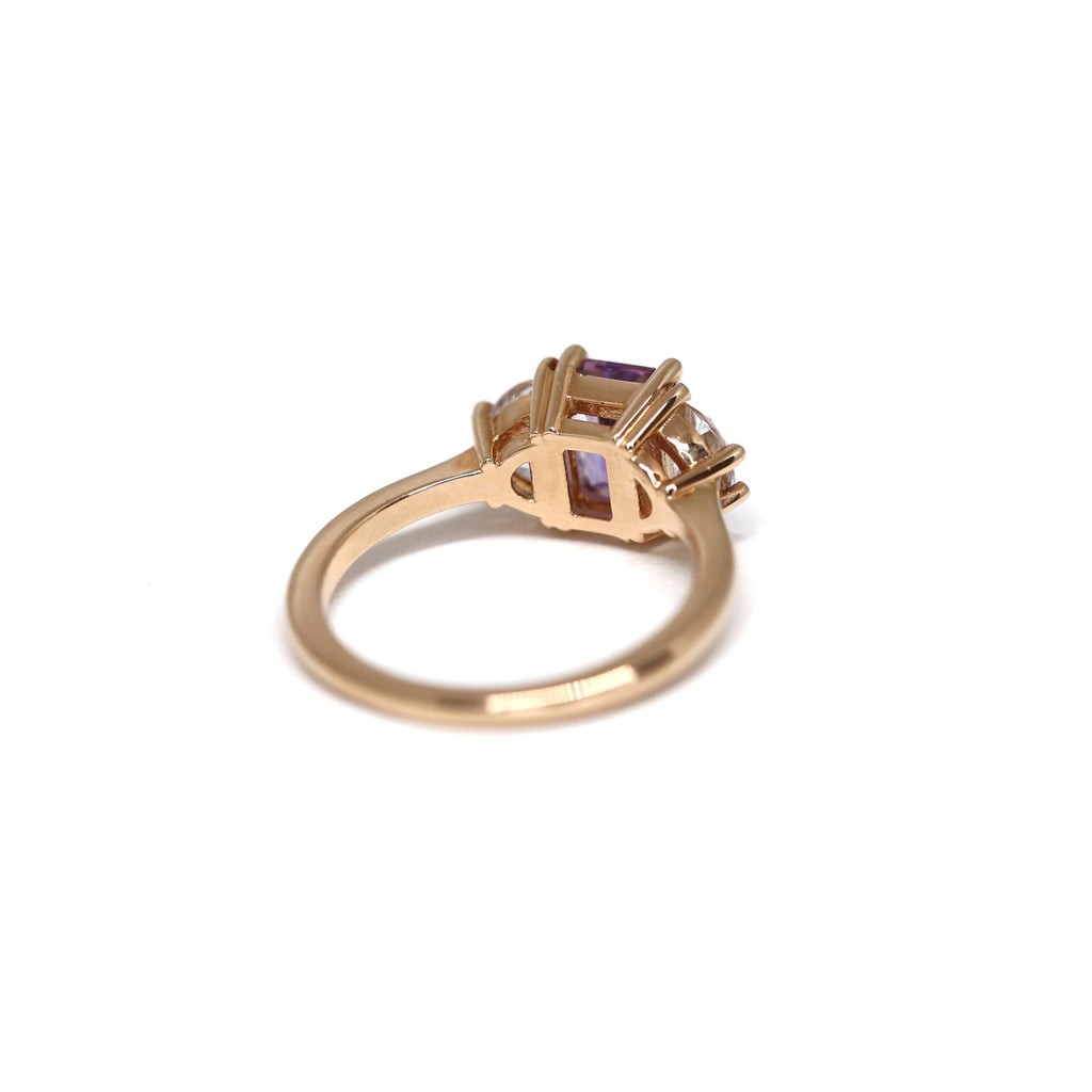 Back of rose gold engagement ring handmade in Montreal by designer Cecilia Lico and available at high end jewelry store Ruby Mardi, located in Little Italy. Stunning bicolor amethyst and transparent topazes
