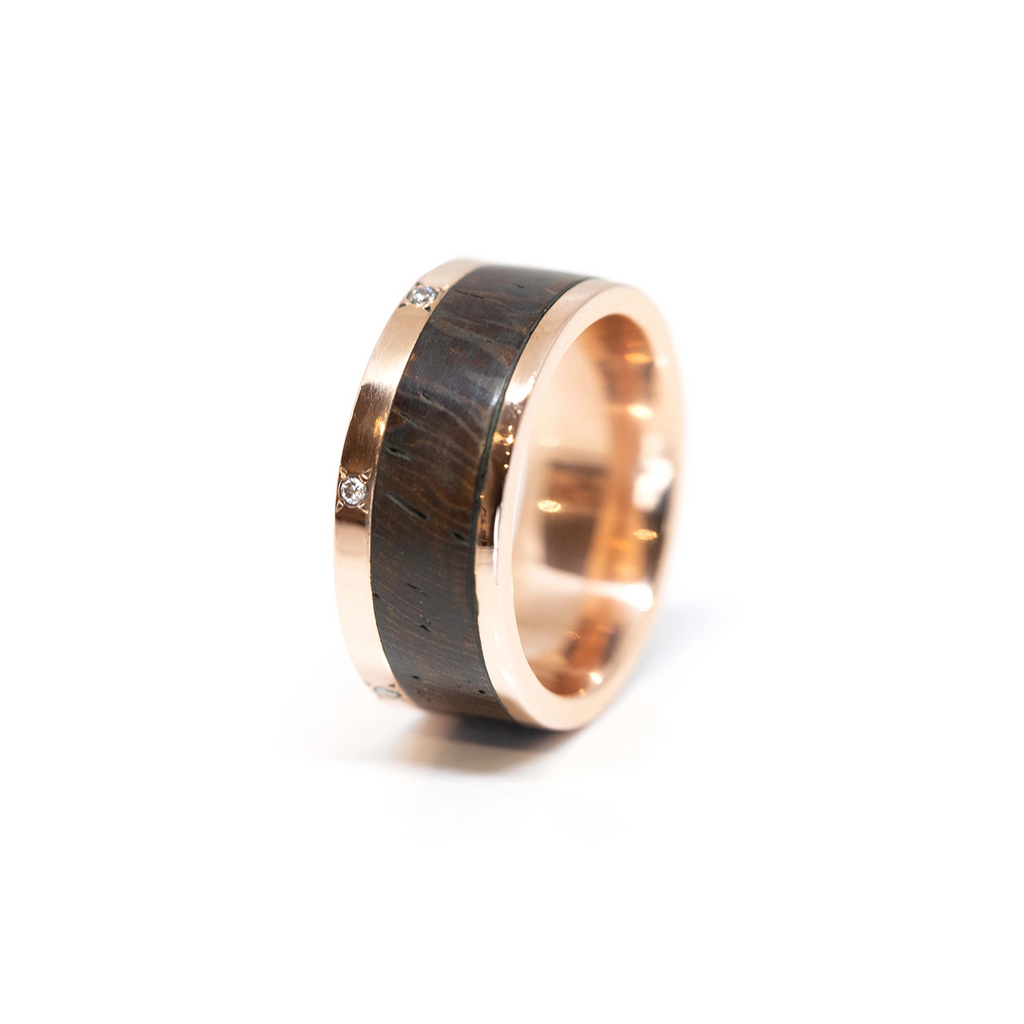 side view of wood and rose gold diamond men ring designer and wedding band for gentleman made in montreal at the best jewelry store boutique ruby mardi montreal on a white background