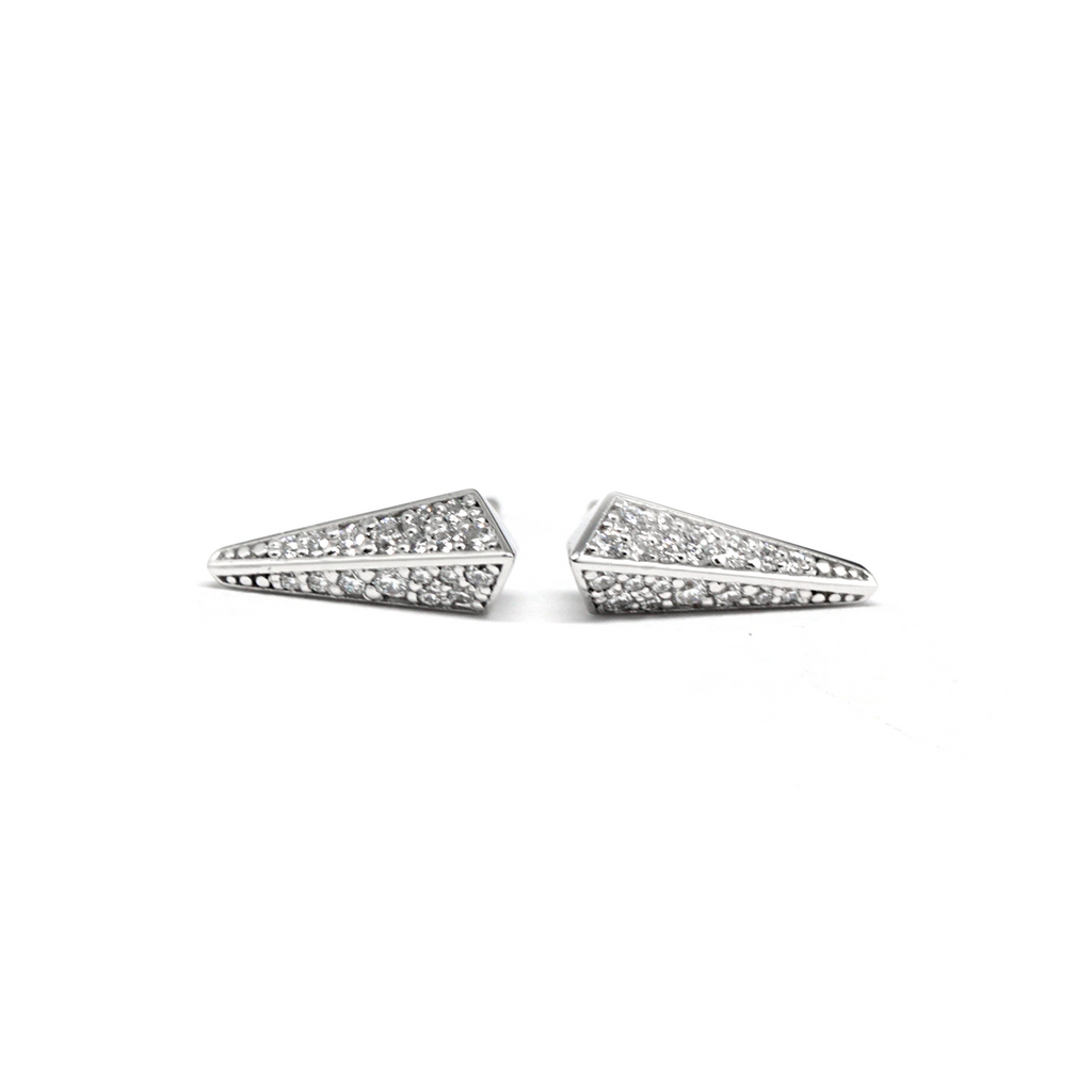front view of bena jewelry white gold diamond stud earrings custom edgy jewelery custom made in montreal on a white background