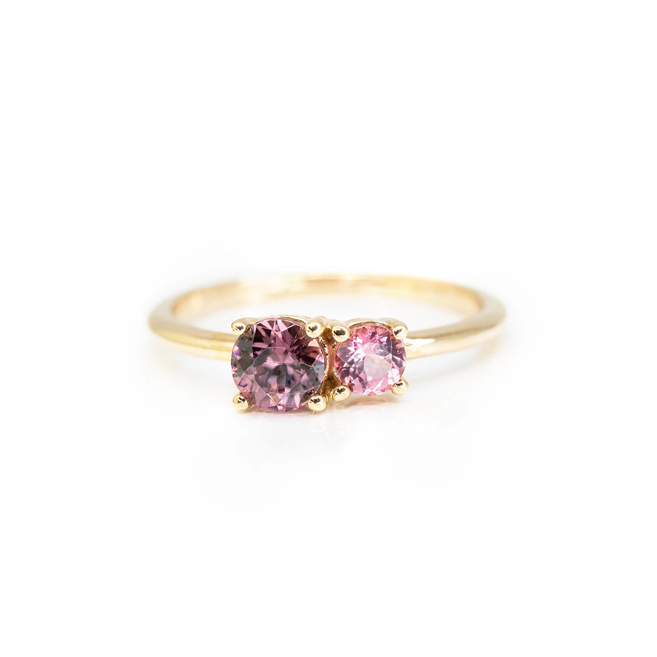minimalist peach zircon and spienl gemstone yellow gold ring custom made in montreal by lico jewelry designer at boutique ruby mardi best jewellery store in quebec on a white background