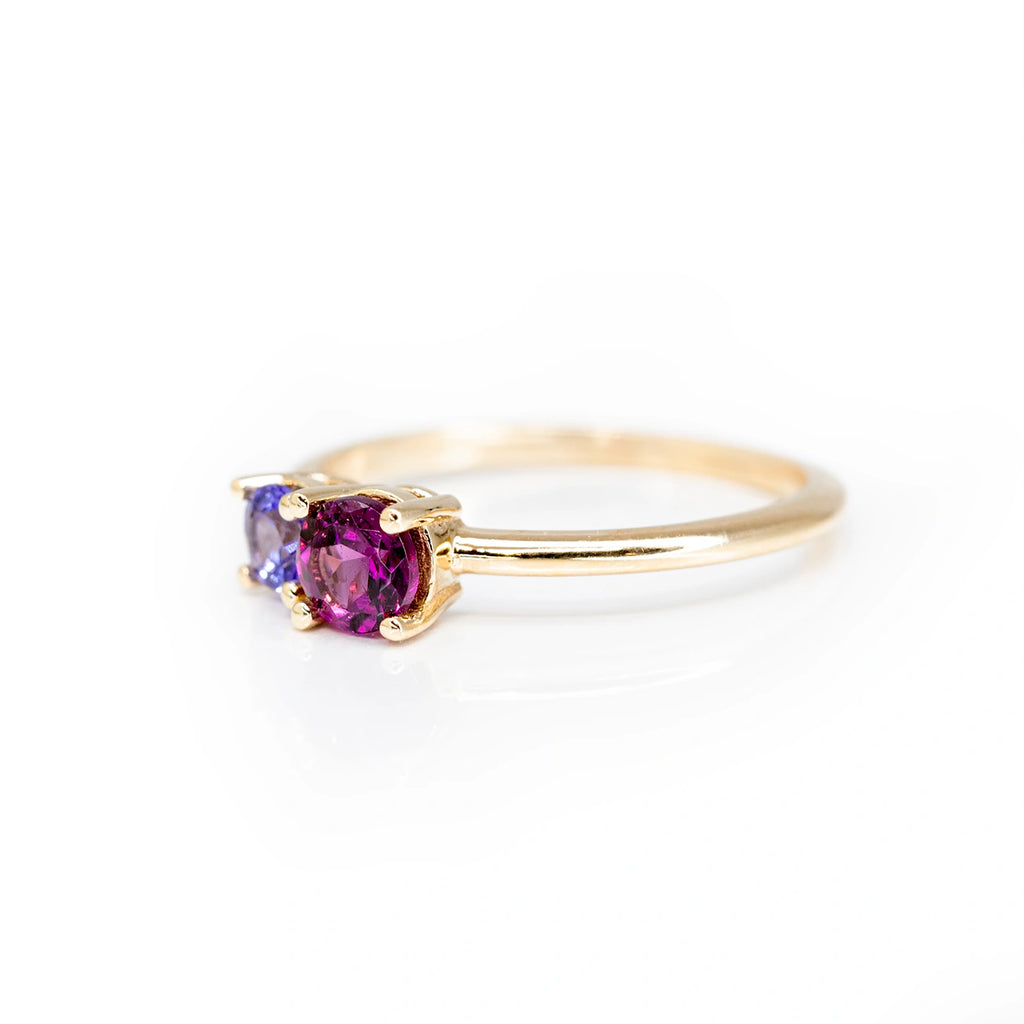 side view of yellow gold minimalist colored gemstone ring custom made in montreal at the best jewelry store in little italy made by the fine jewellery designer lico on a white background