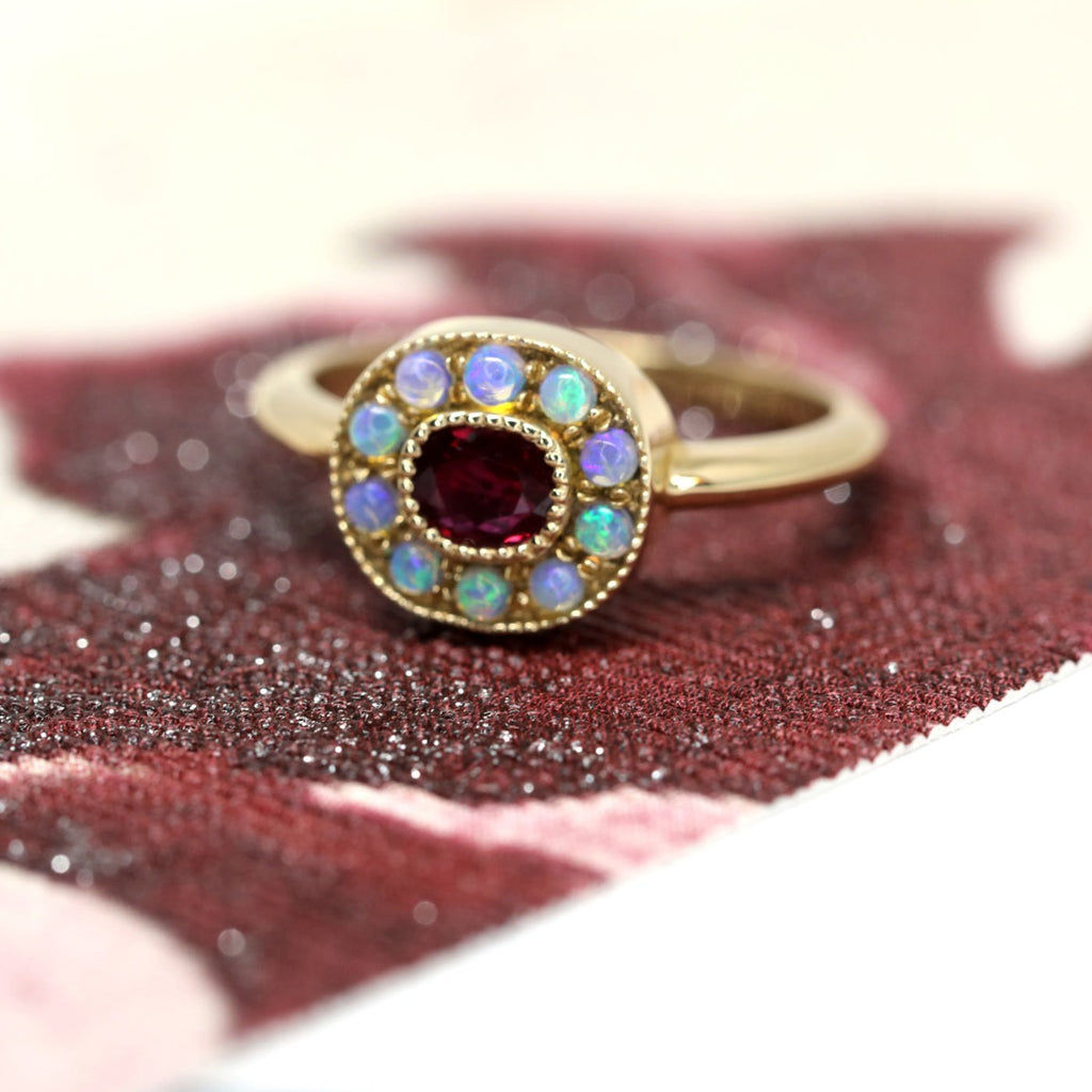 Gemstone rings with ruby and mini opals created by Lico Jewelry in Montreal. Fine exquisite designer jewelry at high end store Ruby Mardi in Little Italy. 