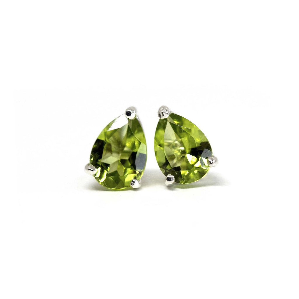 pear shape peridot stud earrings made in montreal for ruby mardoi jeweler on a white background