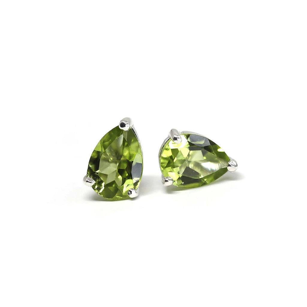 front view of pear shape peridot green natural gemstone stud earrings made in montreal by ruby mardi jewellery designer in montreal little italy jeweler on a white background