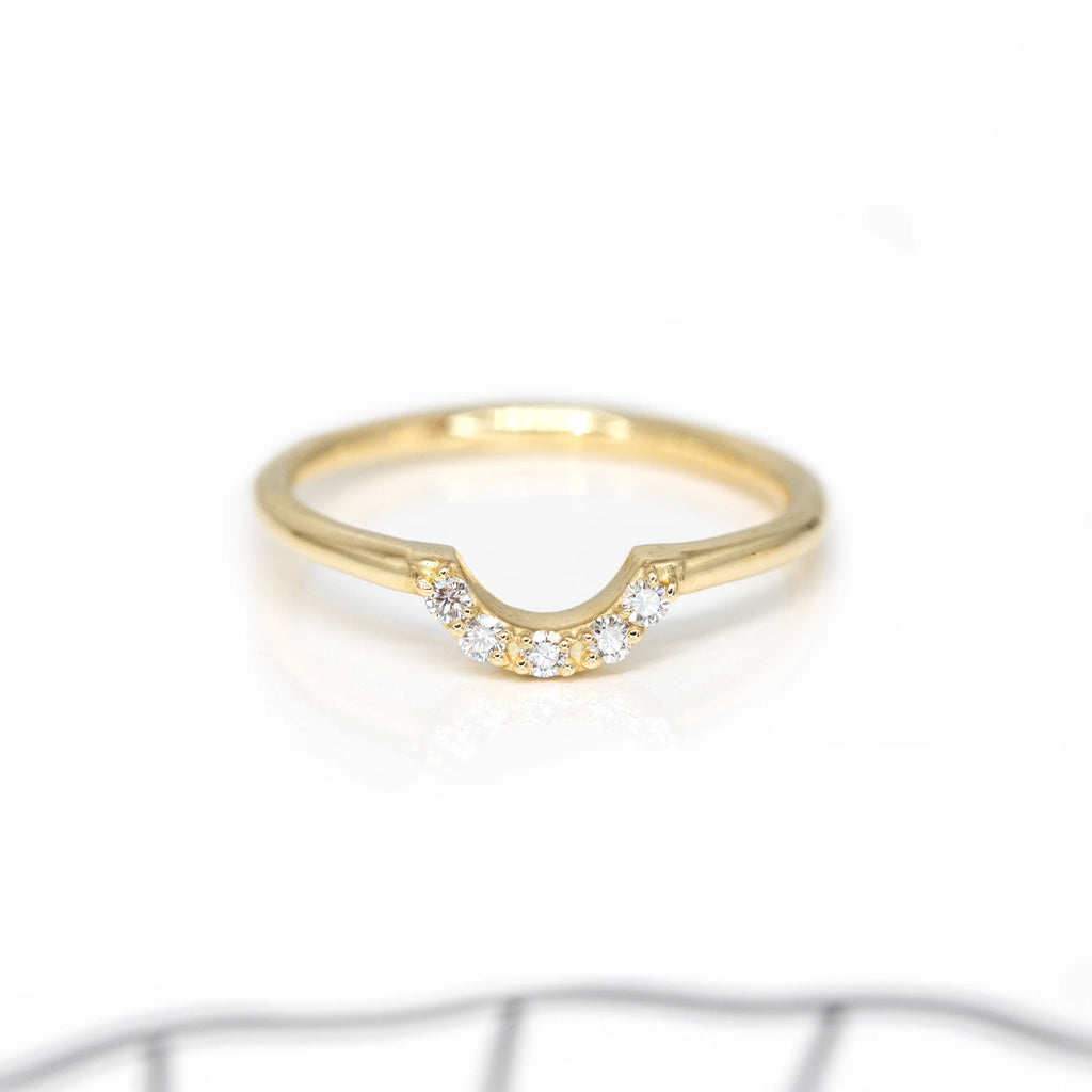 yellow gold diamond wedding band designer ring made in montreal by sheena for the jewer boutique ruby mardi on a white background