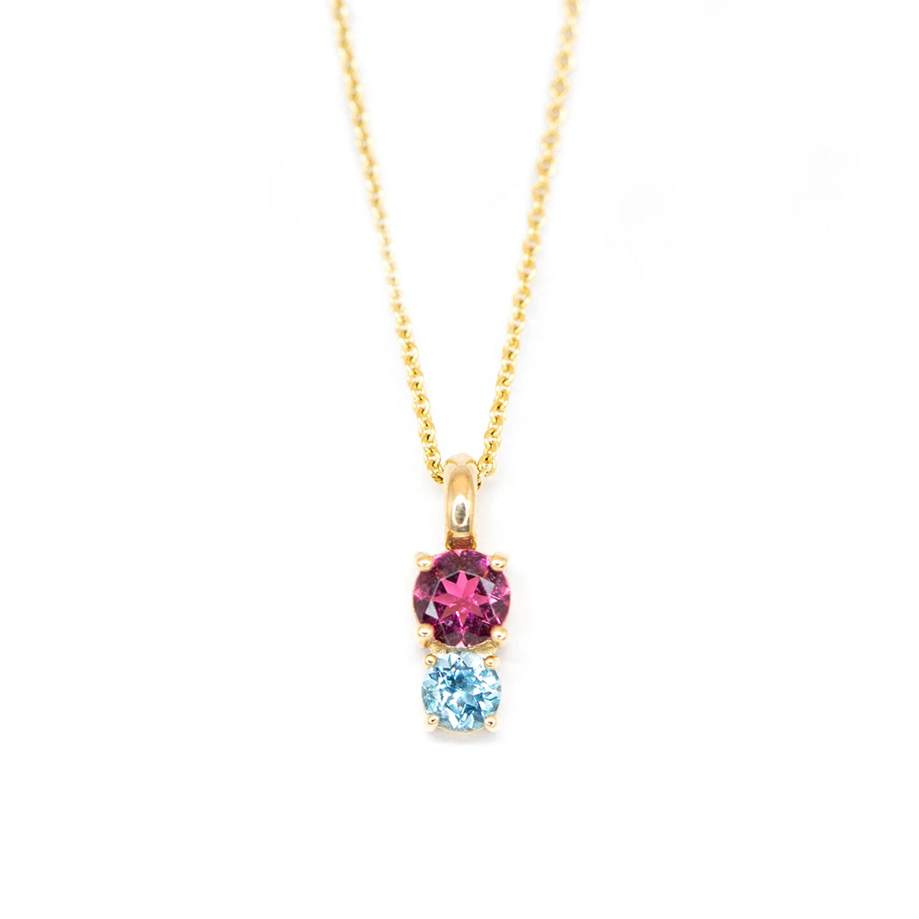 lico jewelry gold pendant with colored gemstone tourmaline and blue topaz gems fine jewellery made in montreal at the best jeweler ruby mardi on a white bnackground