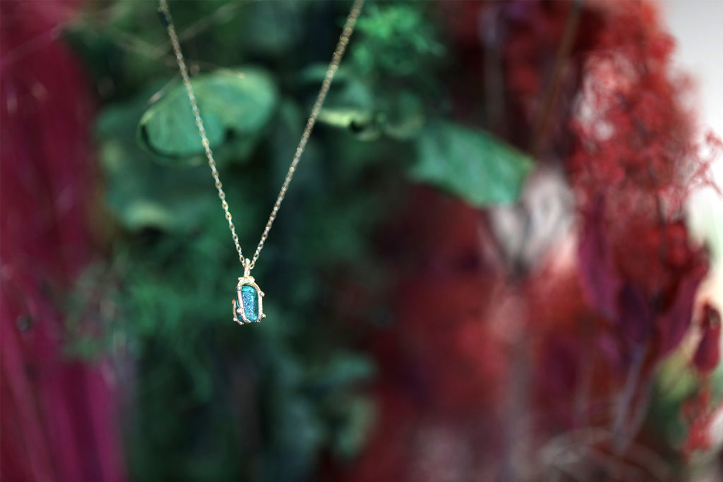 Delicate gold pendant with a beautiful raw emerald by Toronto-based jewelry designer Meg Lizabet. Ruby Mardi present the work of the most talented young Canadian jewelry designers. The only fine jewelry gallery in Montreal.