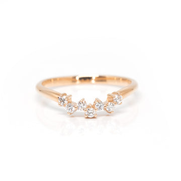 Dainty rose gold diamond wedding band photographed on a white background. Handmade in Montreal by jewelry brand Ruby Mardi.