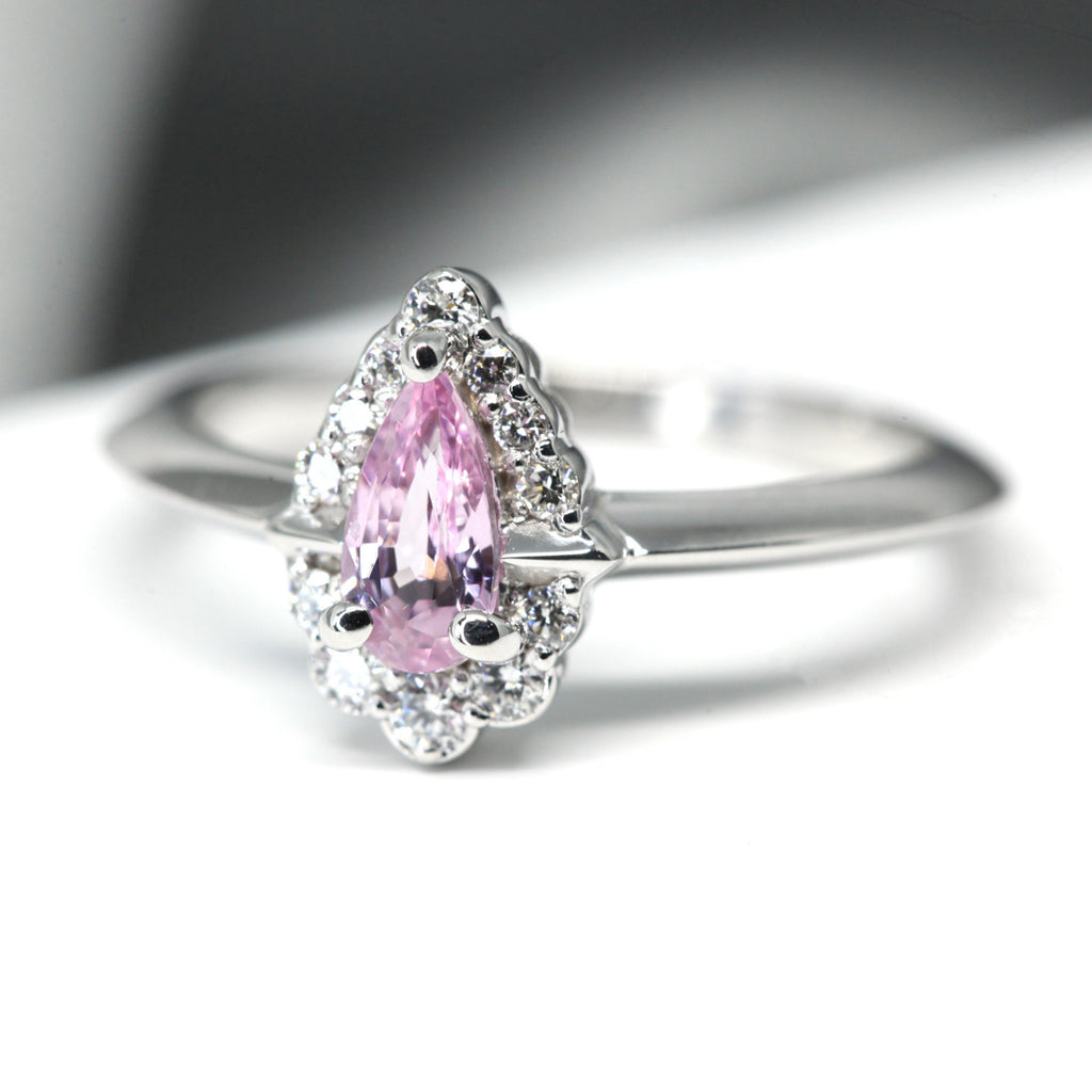 side view of diamond pink sapphire white gold bridal engagement ring montreal made by ruby mardi jeweller