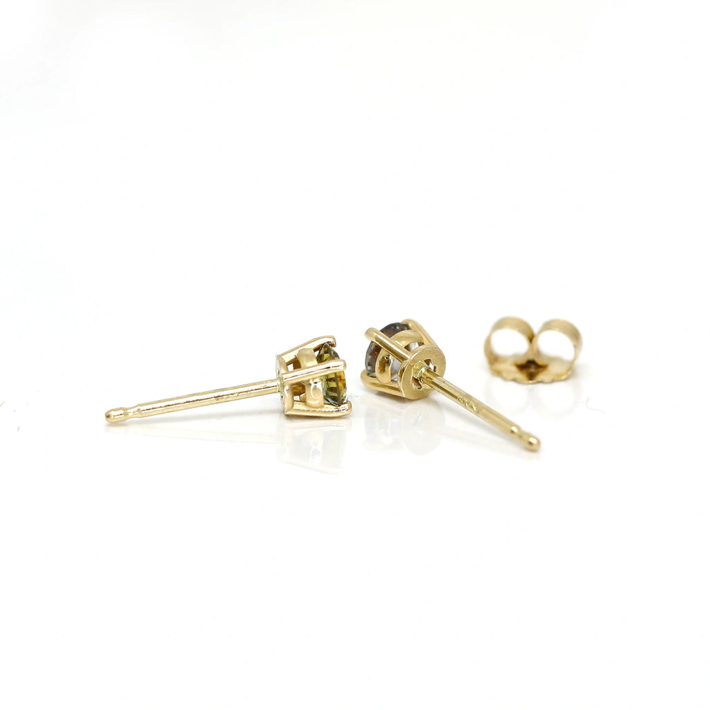 back view of yellow gold minimalist colored gemstone stud earringe custom made by meg lizabet in montreal jewelry store ruby mardi on a white background