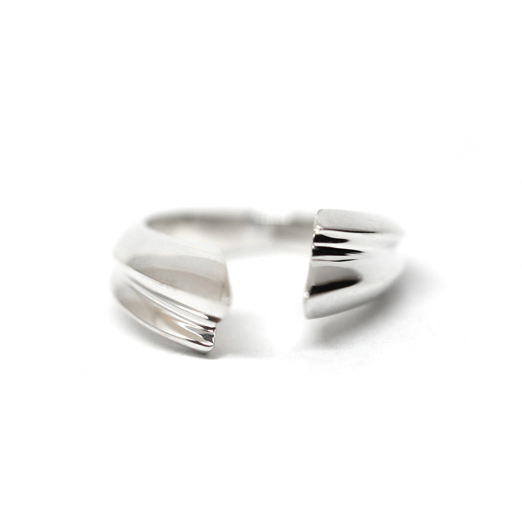 Bold statement silver open ring handmade in Montreal and designed by Bena Jewelry, a Canadian jewellery brand. Also available in solid gold or sterling silver. Find it at Ruby Mardi in Montreal’s Little Italy.