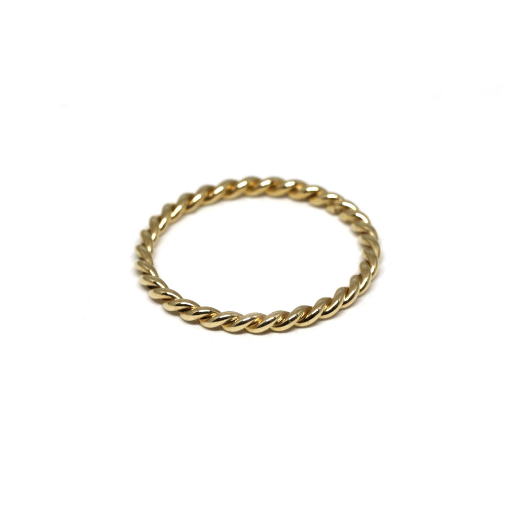 Classic 10k yellow gold twist ring for everyday wear. Available at jewelry store Ruby Mardi in Montreal.