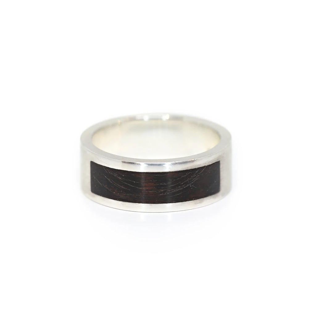 silver and wood men ring at jeweller boutique ruby mardi montreal Janine de Dorigny designer on a white background