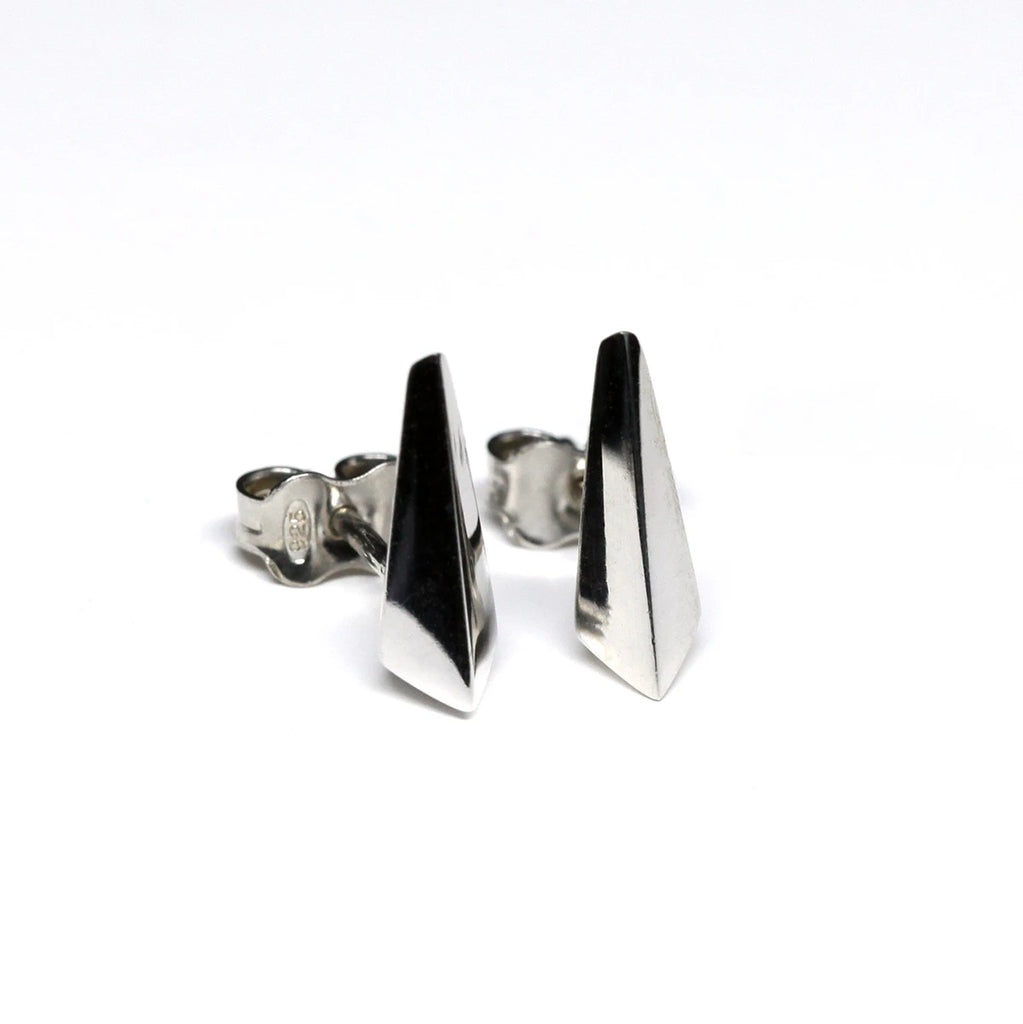 silver blade earirngs made in montreal by ruby mardi on a white background