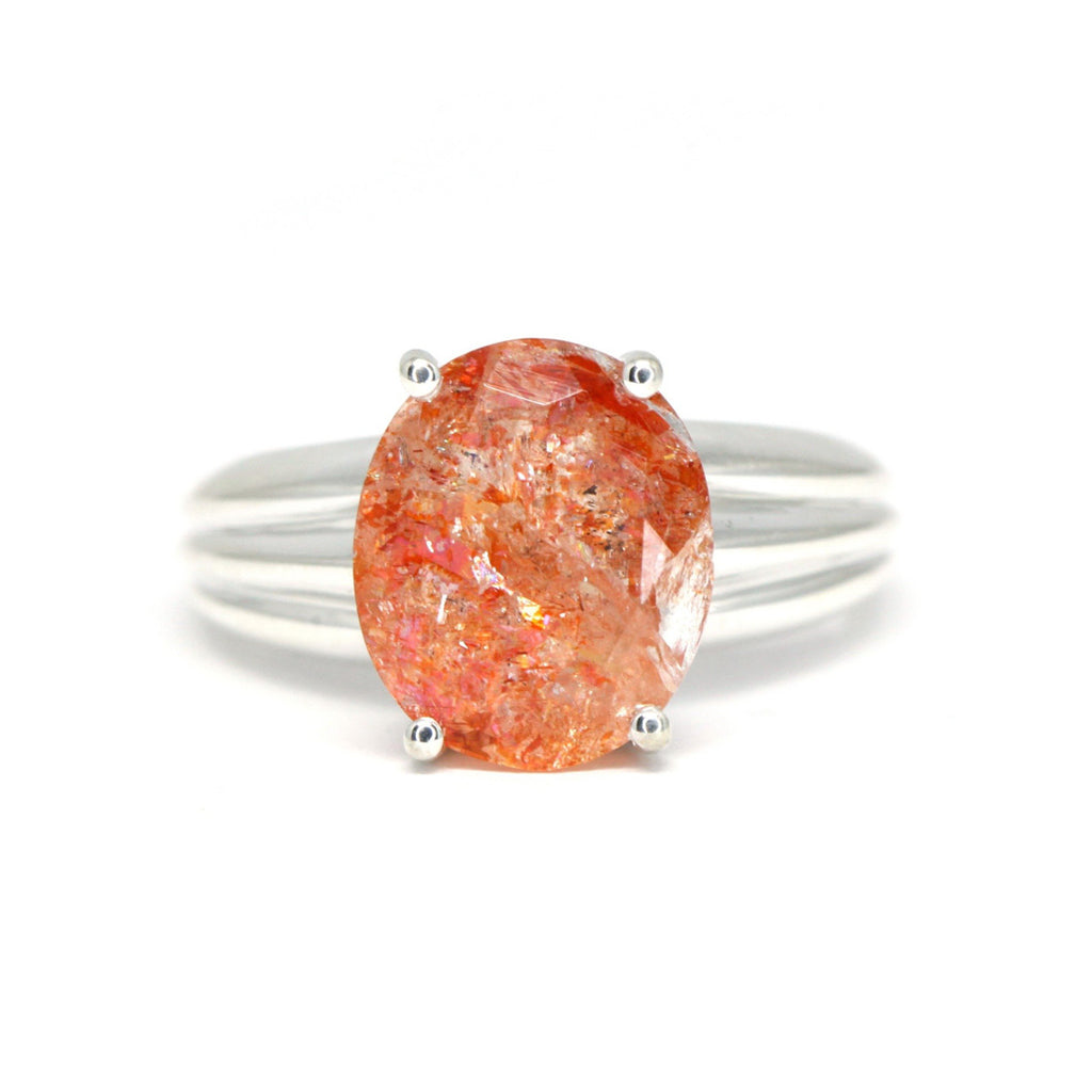 Statement ring featuring a beautiful sunstone. Cocktail ring, gemstone ring designed by Bena Jewelry in Montreal. Edgy Jewelry. Find Bena Jewelry work at Ruby Mardi in MOntreal's Little Italy. We sell fine jewelry and gold jewelry by the most talented Canadian Jewelry Designers.
