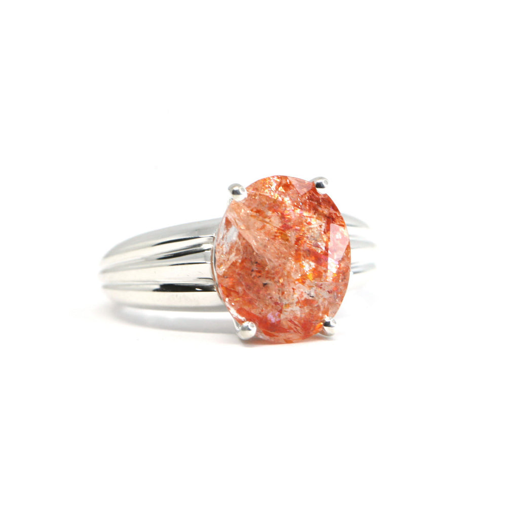 Statement ring featuring a beautiful sunstone. Cocktail ring, gemstone ring designed by Bena Jewelry in Montreal. Edgy Jewelry. Find Bena Jewelry work at Ruby Mardi in MOntreal's Little Italy. We sell fine jewelry and gold jewelry by the most talented Canadian Jewelry Designers.