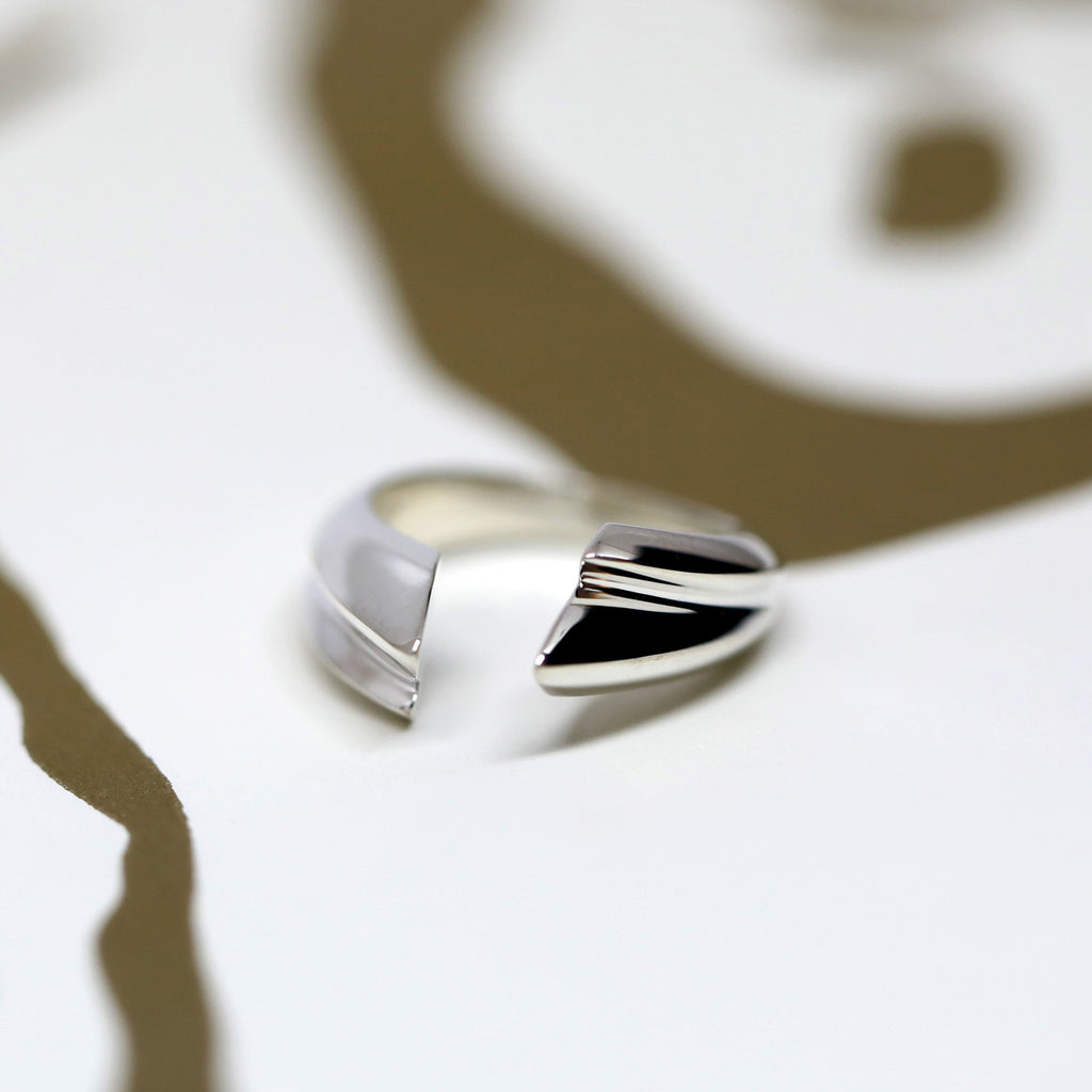 Bold statement sterling silver open ring handmade in Montreal and designed by Bena Jewelry, a Canadian jewellery brand. Also available in solid gold or gold vermeil. Find this gender neutral ring it at Ruby Mardi in Montreal’s Little Italy.