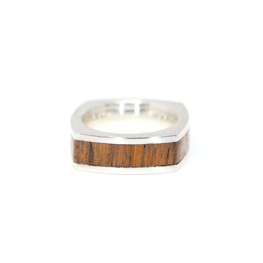 men ring design wood and silver ring made by Janine de Dorigny artisan designer for boutique ruby mari jeweller in montreal little italy fine jewelry on a white background