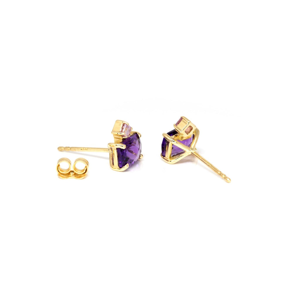 Back view of amethyst and asscher cut pink sapphire stud earrings. More gemstone jewels available at Ruby Mardi, a fine jewelry store in Montreal’s Little Italy.