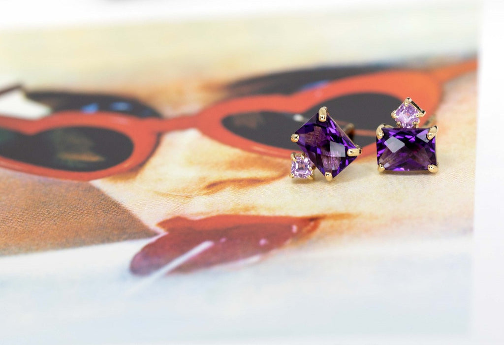 Yellow gold amethyst gemstone studs with asscher cut pink sapphire and amethyst. These bridal earrings were handmade in Montreal by jewelry brand Ruby Mardi.