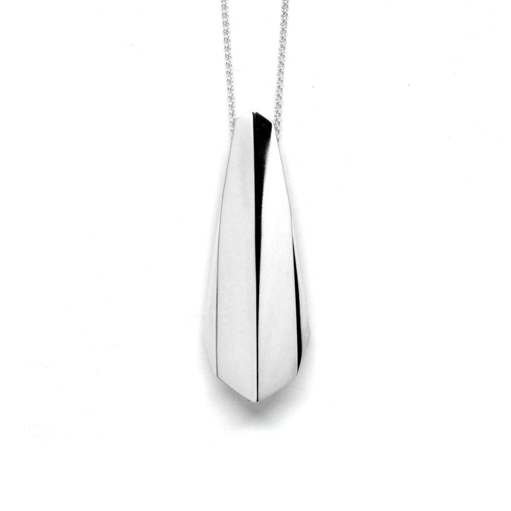 silver edgy pendant unisex bena jewelry designer made in montreal for boutique ruby mardi jeweler on a white background