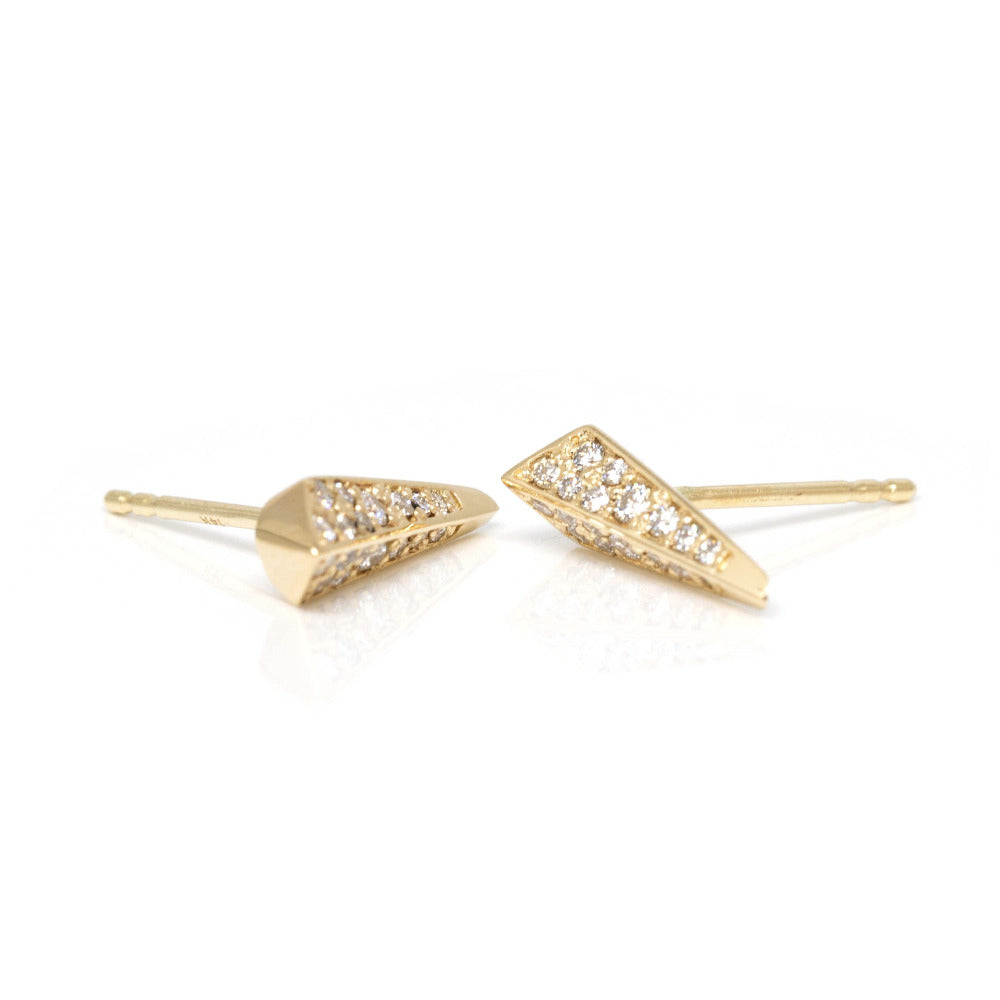 side view of diamond studs custom made yellow gold earrings in montreal by boutique ruby mardi best jewelry store in canada designer jewels bena edgy earrings on white background